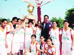 The NPS girls with the trophy in Chandigarh on Monday.