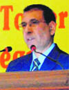 Jagdish Kishwan addresses a seminar at FRI, Dehradun.