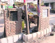 Two foundation stones in mayors ward, one of which was laid in 1997 to inaugurate a chowk, which is in a pathetic condition