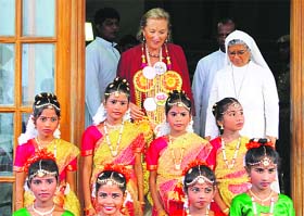 Belgiums Queen Paola (centre) leaves the San Thome Basilica after visiting the tomb of Saint Thomas in Chennai