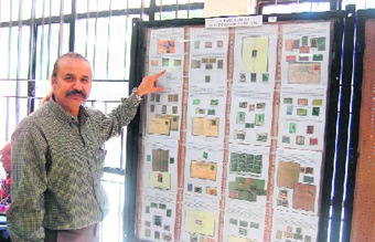 Rajesh Varma with his collection of stamps.