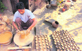 A potter at work in Jammu.