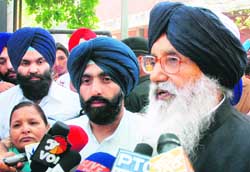 Punjab Chief Minister Parkash Singh Badal talks to mediapersons in the district courts complex in Sector 17, Chandigarh. 