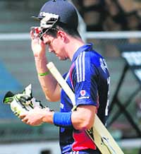 Englands captain Kevin Pietersen walks back to the pavilion after losing his wicket for a duck during a warm-up match against MCA XI at the Brabourne Cricket Stadium in Mumbai on Tuesday. 