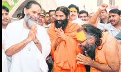 Swami Ramdev and Swami Gyananandji Maharaj (left) at the inauguration of a gaushala in Karnal