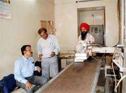 Officers from the Atomic Energy Regulatory Board examine an X-ray centre in Amritsar on Wednesday.