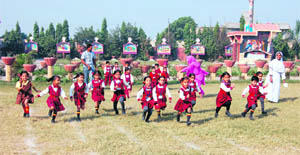 Students participate in 100 m race during Sports Meet of Sacred Heart Convent School, which was inaugurated on Wednesday.