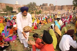 Gurpurb celebrations: Langar being served at the Qila Mubarak gurdwara in Bathinda on Thursday.