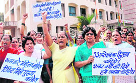 Congress workers demonstrate against partys inadequate seat allocation for women in the Assembly elections, in Bhopal on Thursday.