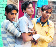Pawan Kumar Pandey (centre) who reportedly came to DAV School-8, Chandigarh, drunk on Friday.