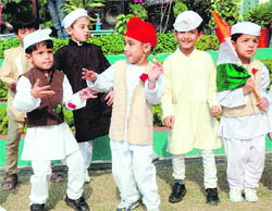 Tiny tots of Tender Heart school dressed up as Jawahar Lal Nehru, dance on his birthday on school premises in Sector 33, Chandigarh, on Friday.