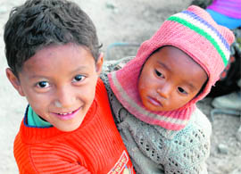  This boy would know more about the child he is holding than Chidrens Day. 