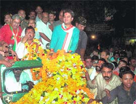 Union minister of state for information technology Jyotiraditya Scindia at a road show during an election campaign for the Madhya Pradesh assembly elections in Gwalior on Thursday. 