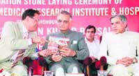Panjab University vice-chancellor Prof R.C. Sobti (left) and Union minister of home affairs Shivraj Patil after releasing Vision-2020 document of the varsity. Union minister of state for finance Pawan Kumar Bansal looks on.