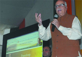 BJP leader L.K. Advani addresses the media after launching the website for the party's chief ministerial candidate V.K. Malhotra at the party office in New Delhi on Saturday.