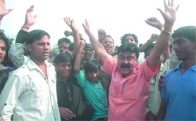 BJP activists protest against the Delhi police where around 30 cows were found slaughtered at Swaroop Nagar in North West Delhi on Saturday.