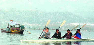 Girls sail in Srinagars Dal Lake on Saturday.