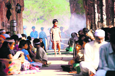A scene from Firaaq in which a displaced Muslim boy is seeking a place for himself