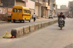 The central verge road project has been dropped after protests by traders on Amrik Singh road.