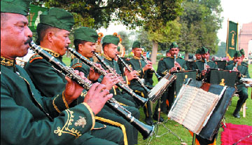 ITBP Band performs at the India Gate lawn on the occasion of the 57th Raising Day in New Delhi on Sunday.