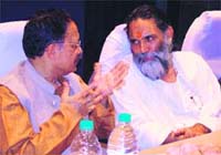 Uttarakhand Chief Minister B.C. Khanduri and Swami Gyananand Ji at the function held in Karnal on Sunday.