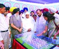 Punjab cooperation minister Capt Kanwaljit Singh being shown the project model in Kapurthala on Sunday.