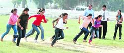 Students of Sportking Institute of Fashion Technology during a race at Government College for Boys grounds in Ludhiana. 