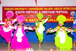 The participants perform bhangra during the inaugural day of the Youth and Heritage Festival at GNN College in Doraha on Sunday. 
