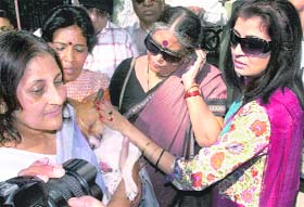 Tollywood actress Debashree Roy (right) at a rally to protest against brutal killing of street dogs in Kolkata