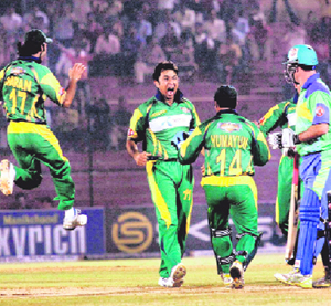 Lahore Badshshas team celebrate the wicket of of Jimmy Maher of Hyderabad Heroes during the third final of the ICL in Ahmedabad on Sunday.