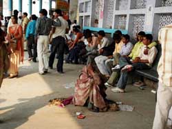 An unidentified elderly woman sits at Gurgaon bus stand. Apparently, none of her relatives or friends came to look for her. 