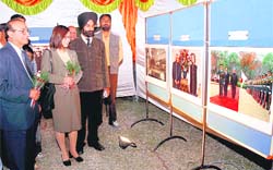 Mizuho Hayakwa, first secretary at the Embassy of Japan, goes around a photo exhibition in Karnal 