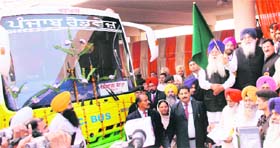 Chief Minister Parkash Singh Badal flags off a new AC bus Shaheed Sukhdev Thapar Memorial Inter-State Bus Terminal in Ludhiana