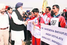 Punjab Chief Minister Parkash Singh Badal meets players from Mauritius after inaugurating the 16th National Sport Meet for Blind