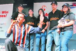 A contensant tries his luck at Samsung Karaoke Contest 