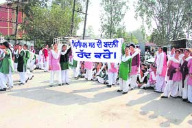 Students of the Government Senior Secondary School for Girls, Fathegarh Churian (Gurdaspur), stage protest in the town