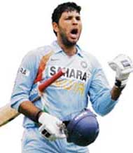 Yuvraj Singh is delighted after completing his century.