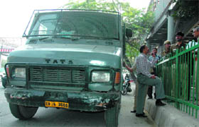 The security agency van after the robbery incident at Satya Niketan in New Delhi on Tuesday.