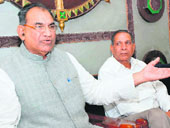 Ram Kumar Gautam, BJP MLA, addresses a press conference in Karnal on Tuesday.
