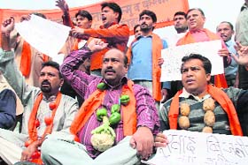 Activists of the Shiv Sena Hindustan protest against the UPA Government failure to check price rise in Jammu
