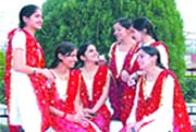 DAVIET girls share a happy moment after the institute lifted the trophy at PTUs inter-zonal youth festiva