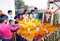 Students of Col. Public School pay tributes to Capt. Umang Bhardwaj.