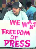 A journalist takes part in a sit-in protest held against the killing of his colleague Konsam Rishikanta in Imphal on Wednesday. Rishikanta was shot dead by unidentified gunmen on Monday. 