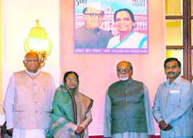 (From left): Lok Sabha Speaker Somnath Chatterjee, union telecom minister A. Raja and former PM I.K. Gujral pose for a photograph after releasing the stamp on late Joachim and Violet Alva, the first couple in Parliament, at Rashtrapati Bhawan in New Delhi