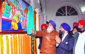 Punjab Chief Minister Parkash Singh Badal inaugurates the commemorative conceptual photograph of Guru Gobind Singh organised by the International Sikh Heritage Centre at Kapurthala House, in New Delhi