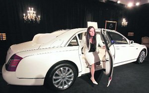 A woman gets out of a Maybach limousine at the "LUXURY, please." fair in Vienna on Friday. The fair for luxury goods takes place from November 21 to 23 in the imperial halls of Vienna's historic Hofburg palace.
