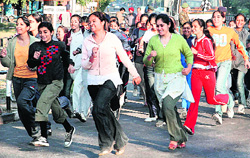 NCC cadets take part in Run for Fun as a part of the NCC Celebrations Week at Sukhna Lake in Chandigarh on Friday. 