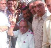 Congress candidate from Adarsh Nagar Mangat Ram Singhal during an election campaign in New Delhi on Friday.