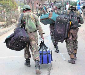 Paramilitary personnel on their way to allocated polling stations