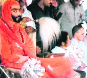 The photograph released by the PDP in which NC chief Omar Abdullah (extreme right) is seen with Dayanand Pandey